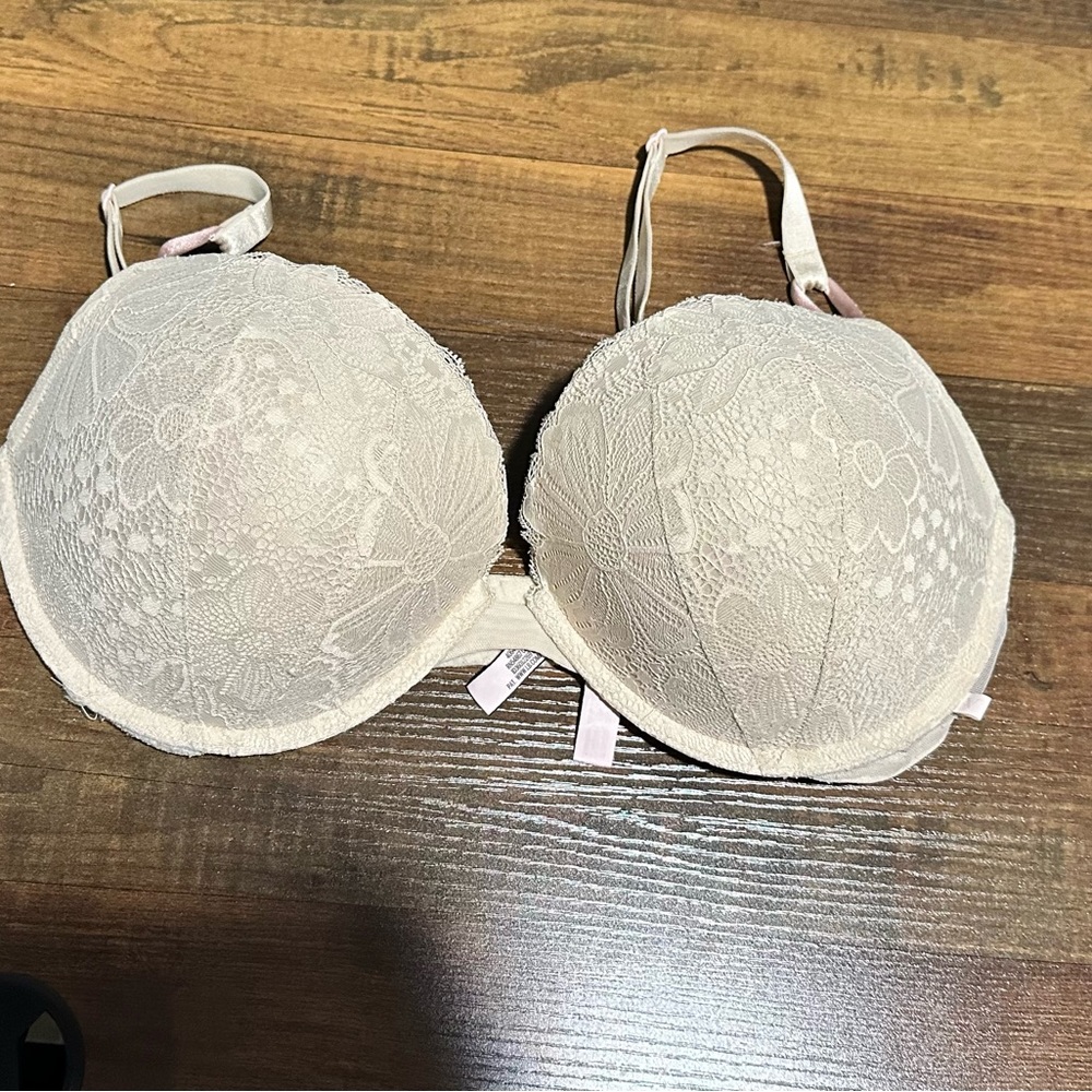 Victoria Secret 36 DD bra in the colored beige or nude.